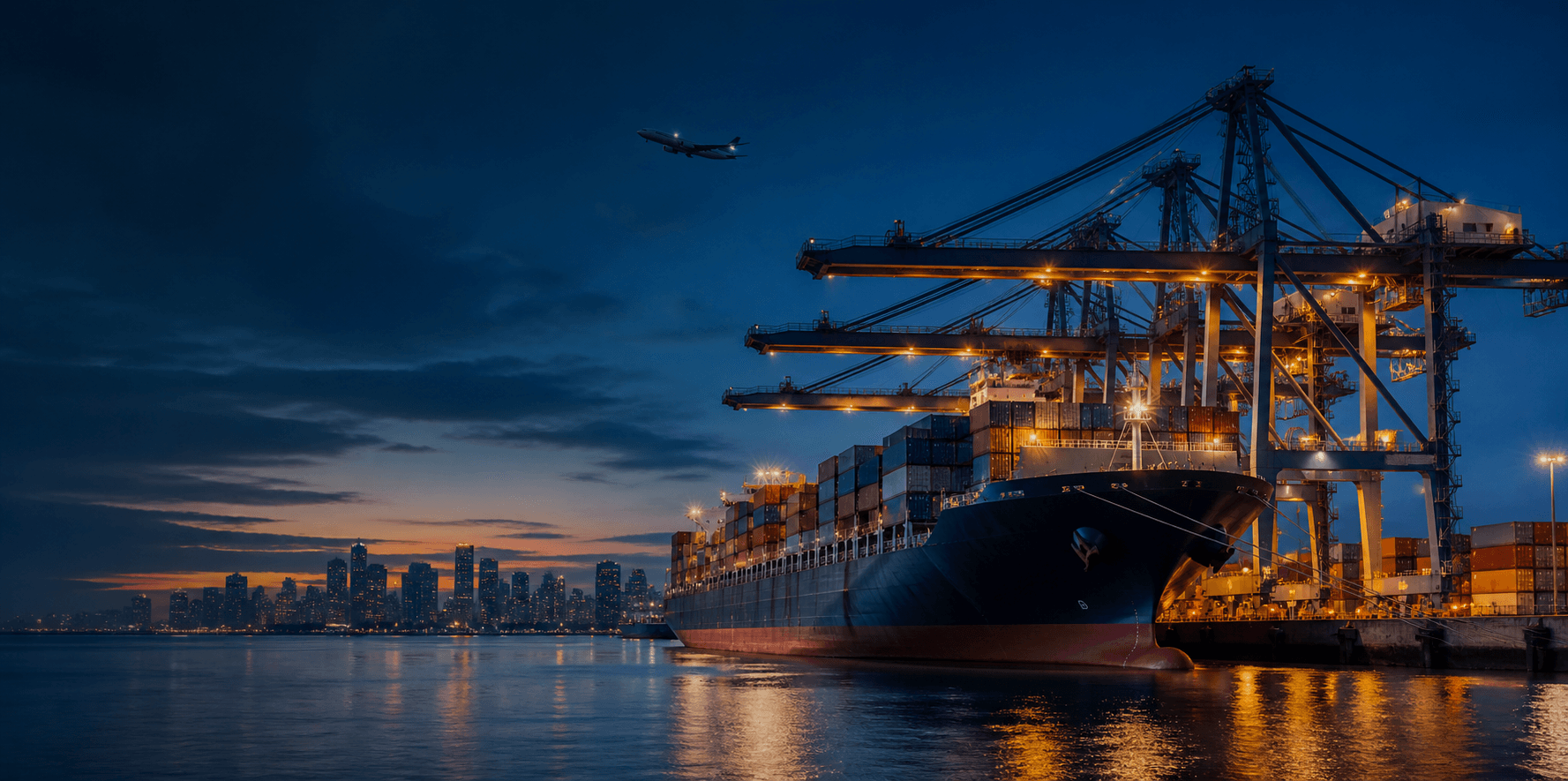 Container ship and cargo aircraft at an international port at dusk